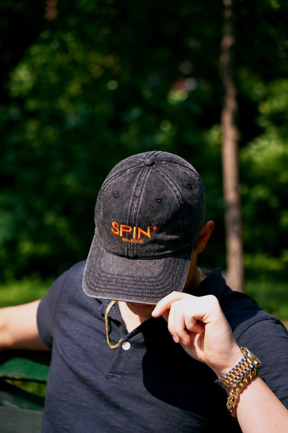 SPIN Club Cap black, worn, cap tipped