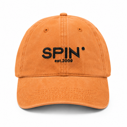SPIN Club Cap orange, front, SPIN est. 2009 in black